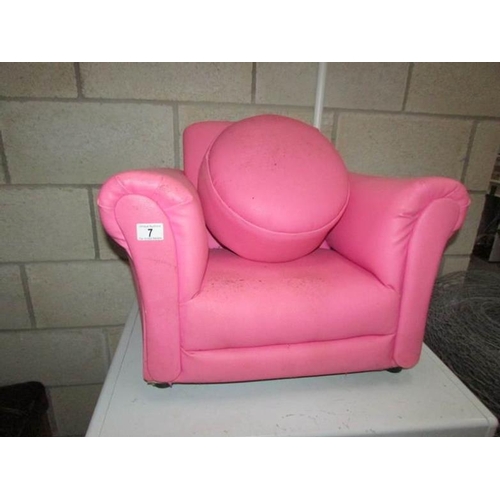 7 - A pink child's chair and stool