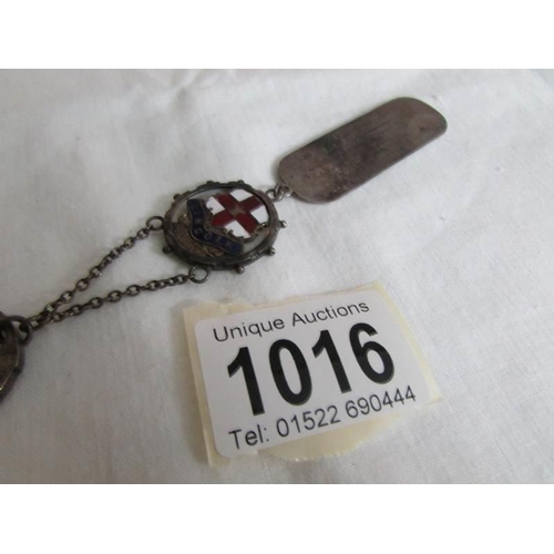 1016 - A Presentation key with silver tag, dated 1952