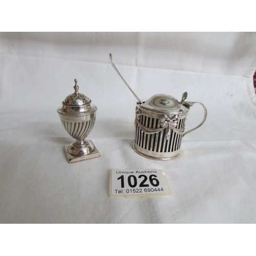 1026 - A silver mustard pot, London 1895 and a silver pepperette, Birmingham 1893