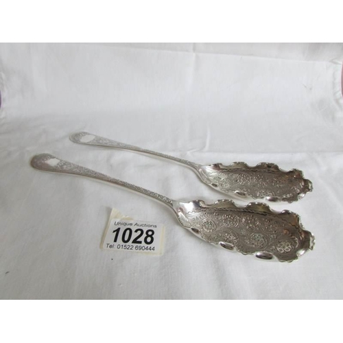 1028 - A pair of very decorative continental silver spoons