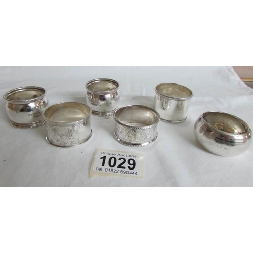 1029 - 6 silver napkin rings, four with Birmingham hall marks and 2 others