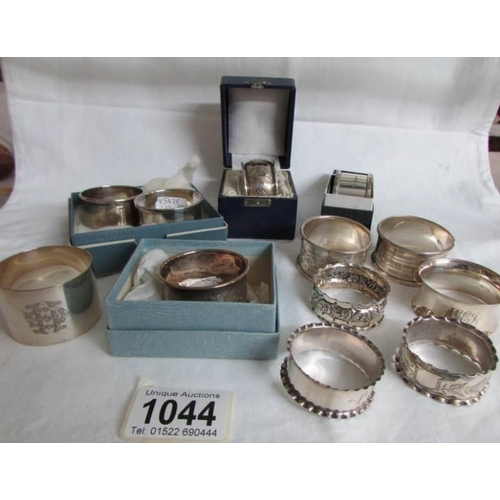 1044 - 12 silver napkin rings, approximately 157g