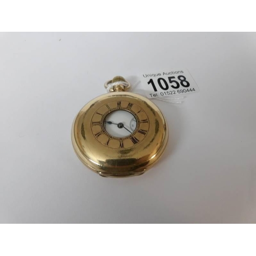 1058 - A gold plated half hunter pocket watch