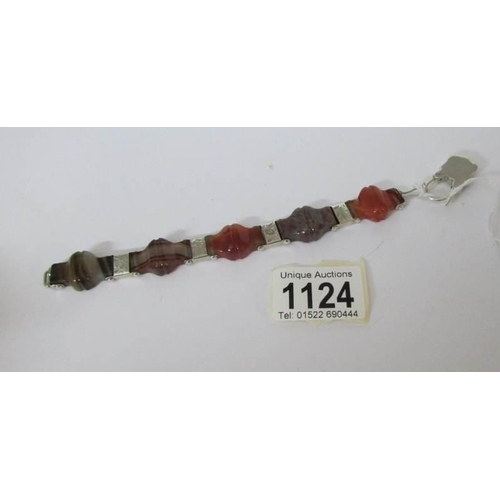 1124 - A Scottish mixed agate bracelet set in silver with agate heart clasp