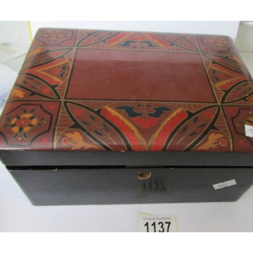 1137 - A lacquered box of costume jewellery including watches, some silver, gold chain etc