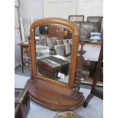 123 - A mahogany toilet mirror