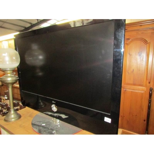 210 - A large LG flat screen TV