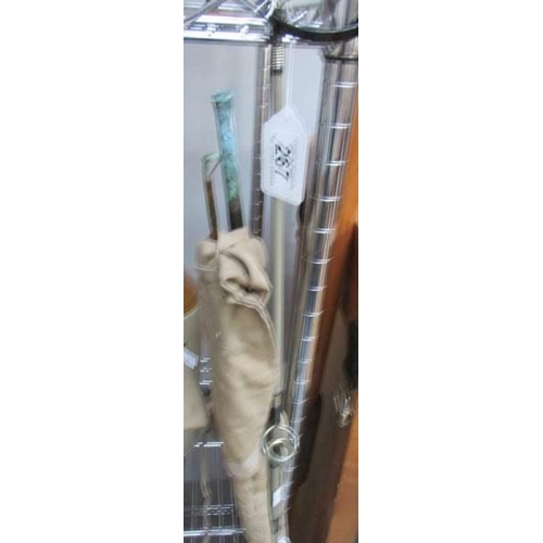 267 - A cane fishing rod (tip a/f) and a ryde spinning rod