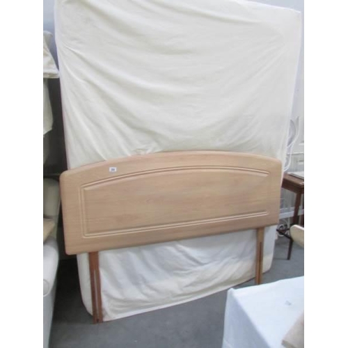 280 - A double drawer divan with mattress and head board