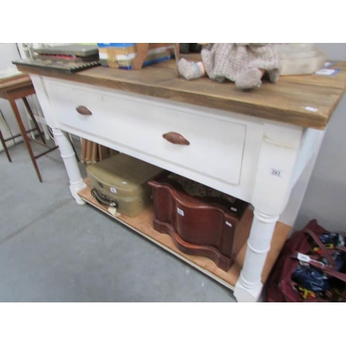 293 - A rustic painted pine dresser base