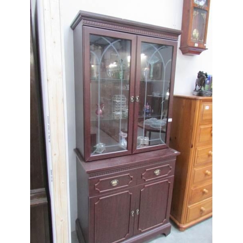 296 - A mahogany cabinet