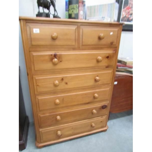 301 - A pine 2 over 5 chest of drawers