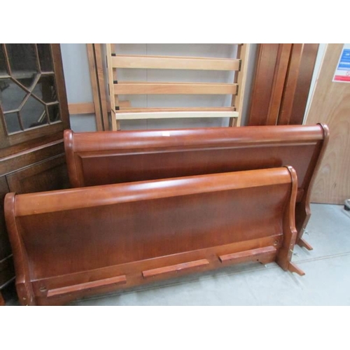 309 - A 5ft mahogany bedstead with slats