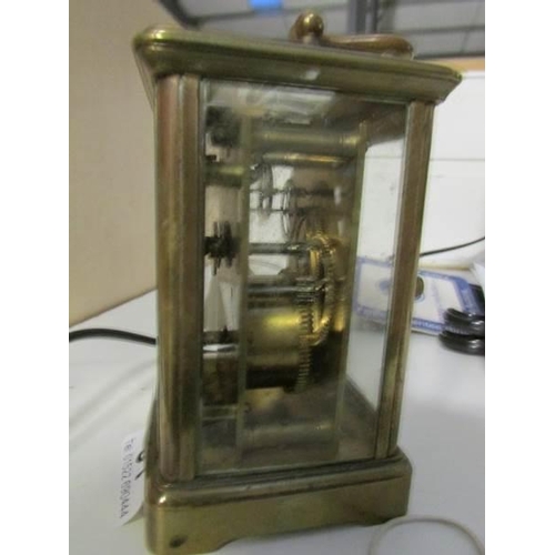 31 - A brass carriage clock