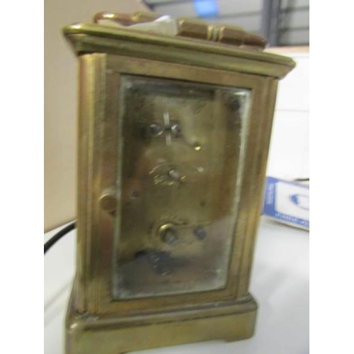 31 - A brass carriage clock