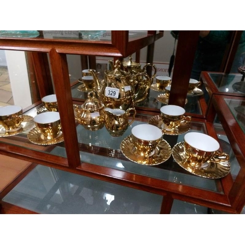 329 - A gilded coffee set