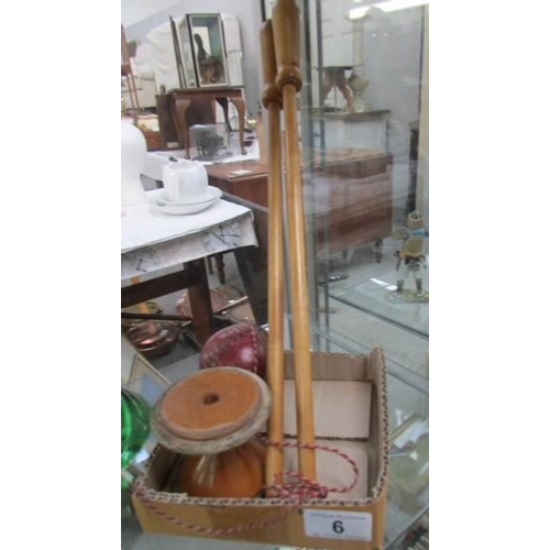 6 - A vintage spinning toy and a vintage cricket ball