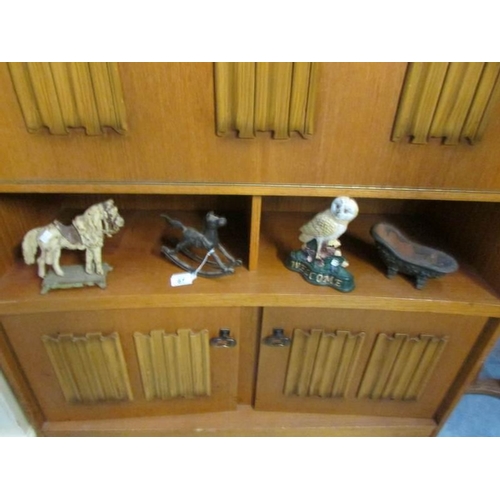 67 - 2 cast metal doorstops, a metal rocking horse and a metal bath