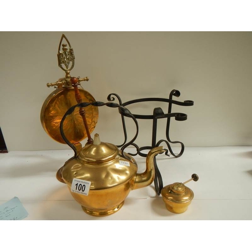 100 - A Victorian brass kettle on stand and an early 20th century brass dinner gong.