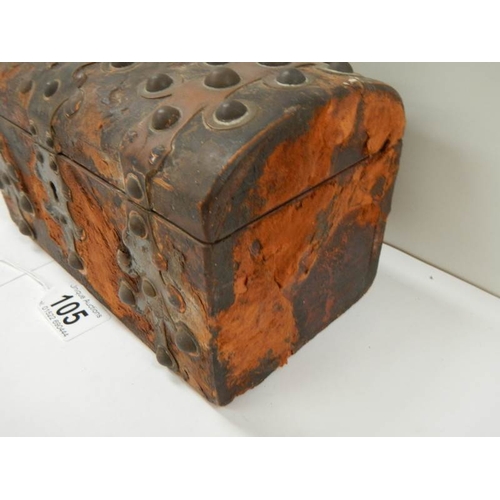 105 - An early Victorian hide covered dome topped glove box with copper mounts, hide a/f.