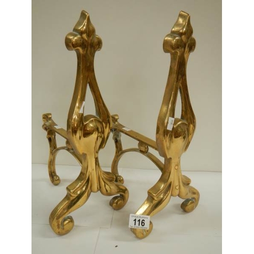 116 - A good pair of solid brass Victorian fire dogs, 16'' high.