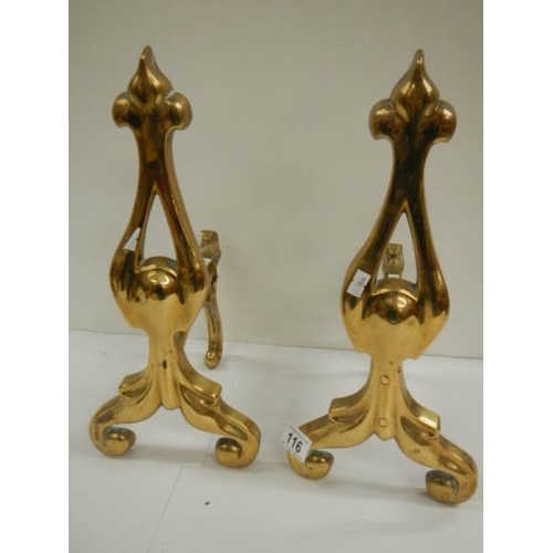 116 - A good pair of solid brass Victorian fire dogs, 16'' high.