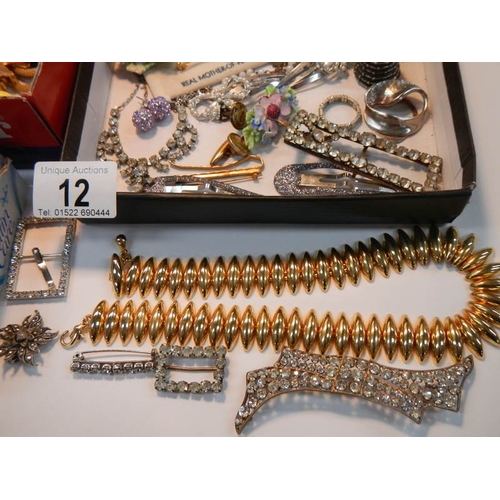 12 - A large mixed lot of costume jewellery.