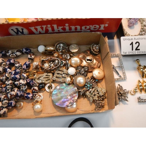 12 - A large mixed lot of costume jewellery.