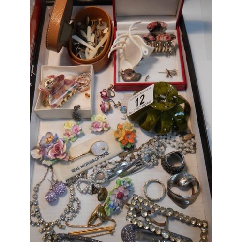 12 - A large mixed lot of costume jewellery.