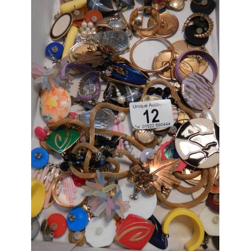 12 - A large mixed lot of costume jewellery.