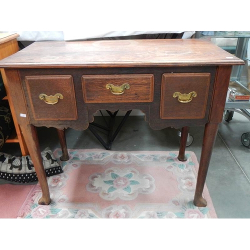 120 - A Victorian oak 3 drawer lowboy.