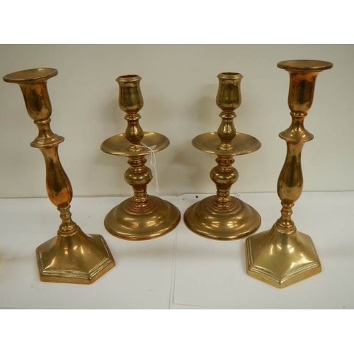 124 - A pair of heavy Georgian brass candlesticks, 9'' tall, in good condition and 1 other pair