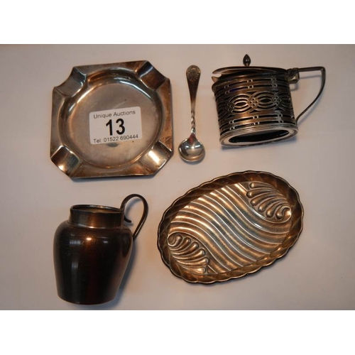 13 - A silver mustard pot with spoons, a Silver pin dish, a silver ash tray and a silver cream jug 138g