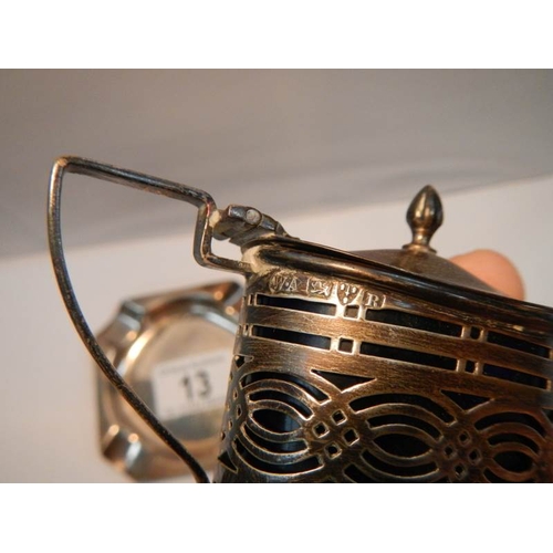 13 - A silver mustard pot with spoons, a Silver pin dish, a silver ash tray and a silver cream jug 138g