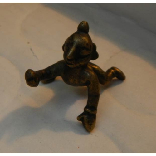 131 - An antique bronze seal (possibly 18th century) and a small bronze figure.