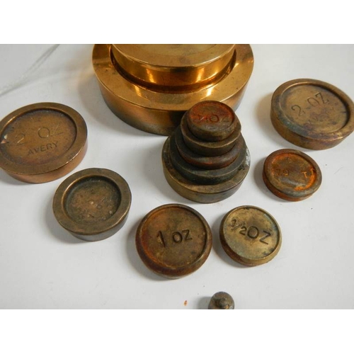 141 - A collection of various brass weights