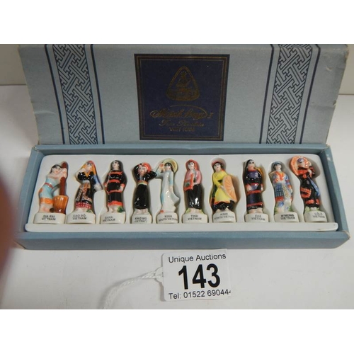 143 - A rare boxed collection of Vietnamese figures.