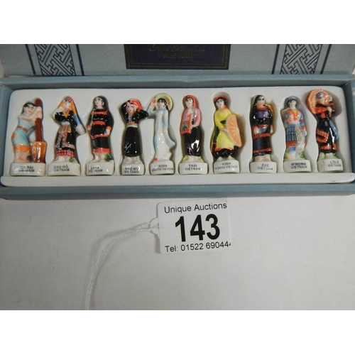 143 - A rare boxed collection of Vietnamese figures.