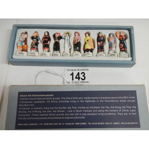 143 - A rare boxed collection of Vietnamese figures.