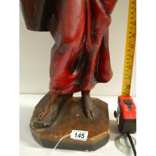 145 - A tall plaster figure with original paintwork, 26'' tall and in good condition.