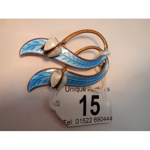 15 - A circa 1970 good quality enamel and silver brooch in a tulip design, marked Norway, Sterling.