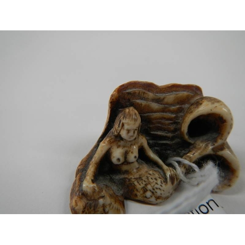 157 - A late 19th century Netsuke.