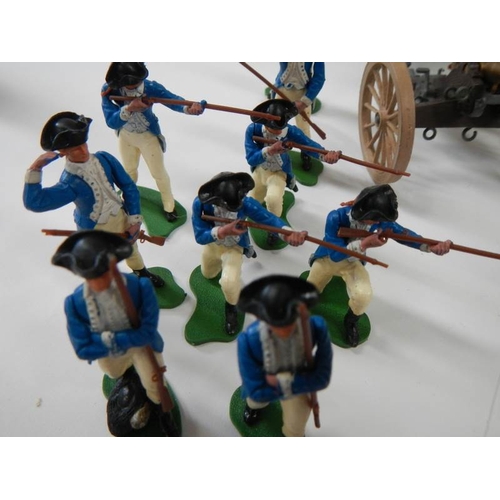 158 - A mixed lot of Britain's soldiers and 2 cannons with moving parts.