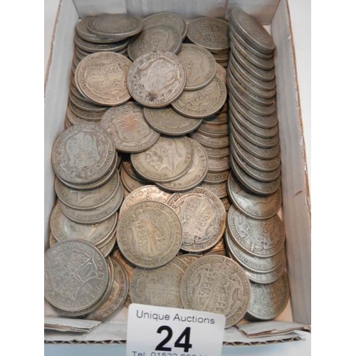 24 - Approximately 1500 grams of British pre 1947 silver half crowns.