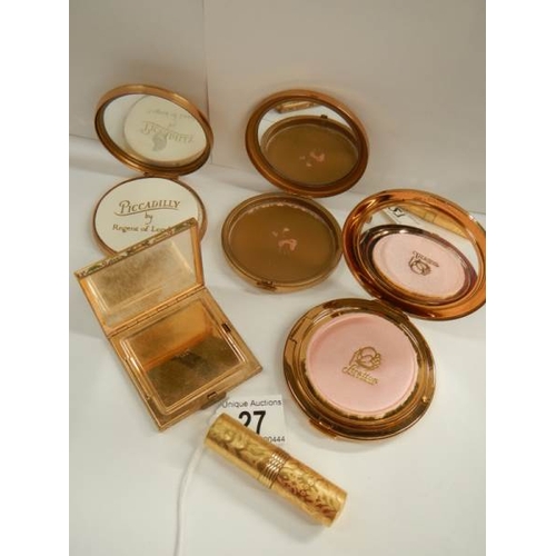 27 - 4 good quality powder compacts including Stratton and a lipstick holder.