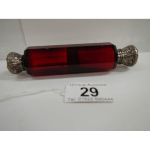 29 - A Victorian ruby glass double ended scent bottle, 5'' long, in good condition.