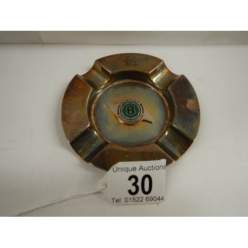 30 - A unusual silver ashtray with Bentley symbol to centre.