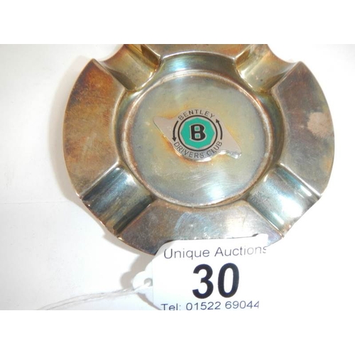 30 - A unusual silver ashtray with Bentley symbol to centre.