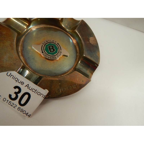 30 - A unusual silver ashtray with Bentley symbol to centre.