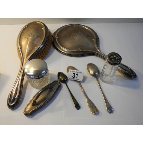 31 - A silver dressing table set and 3 silver spoons (8 items in total).